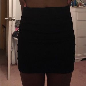 Short black tight mini skirt
